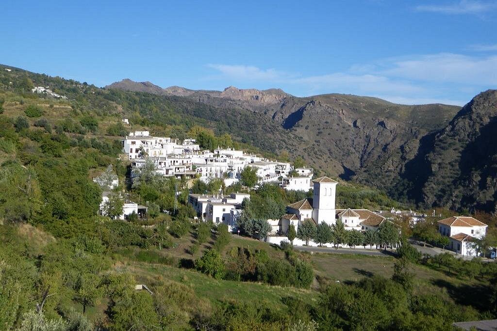 Panoramic sunrise over Alpujarra hills from Alcázar.